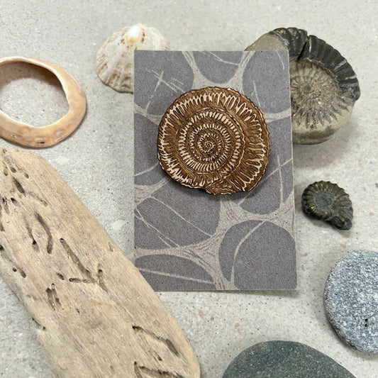 Ammonite etched wooden brooch