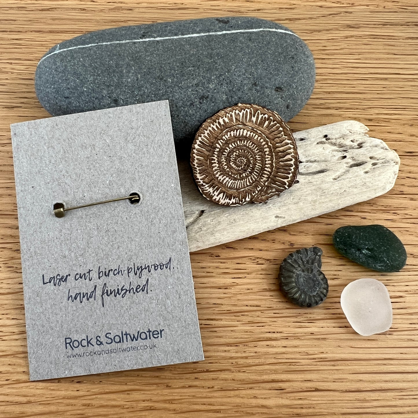 Ammonite etched wooden brooch