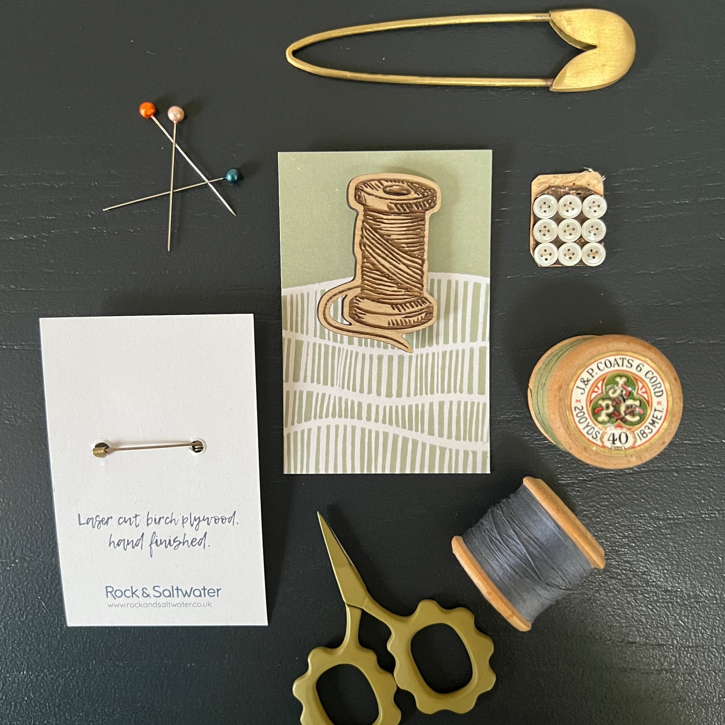 Cotton reel etched wooden brooch