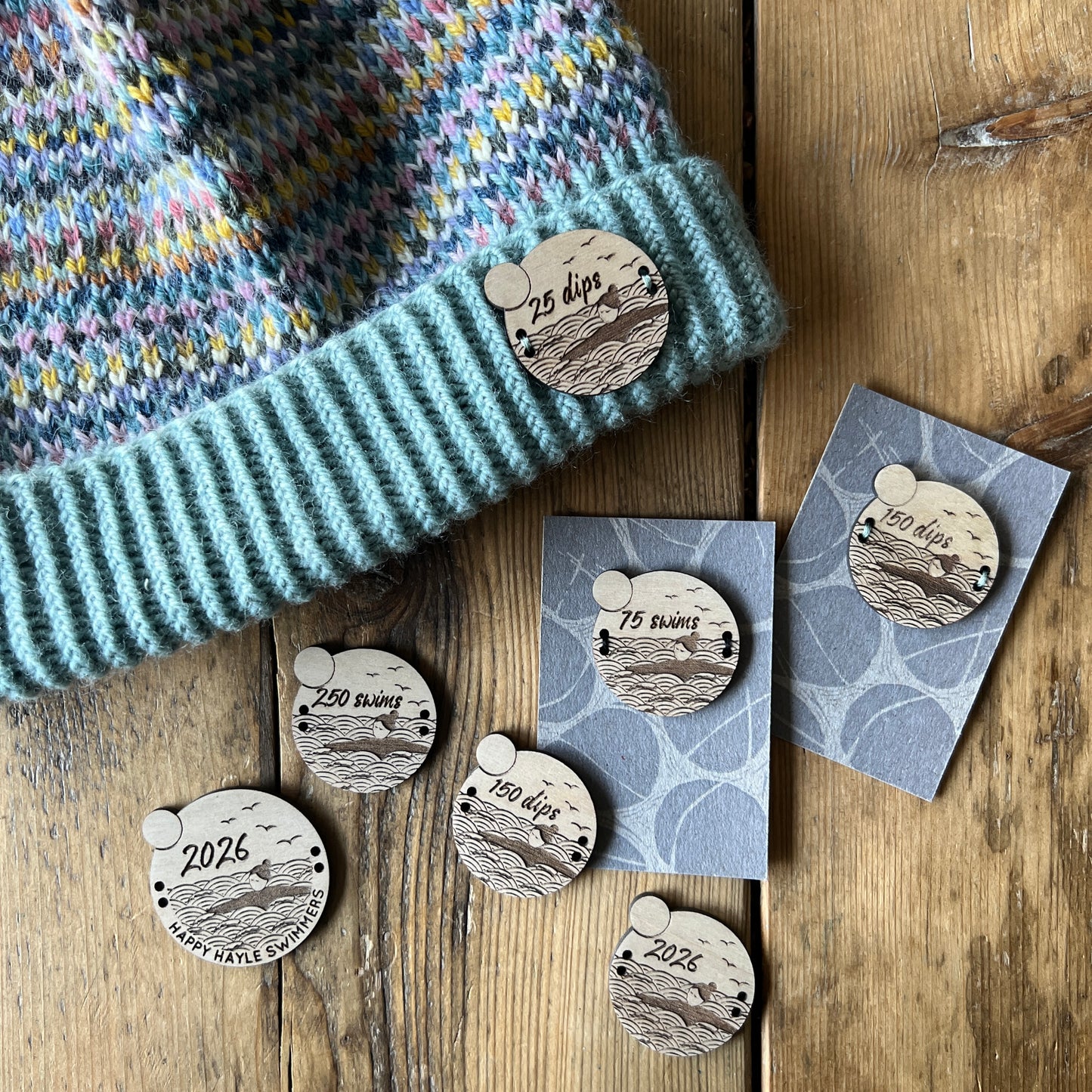 Wild swimming milestone sew-on wooden badges