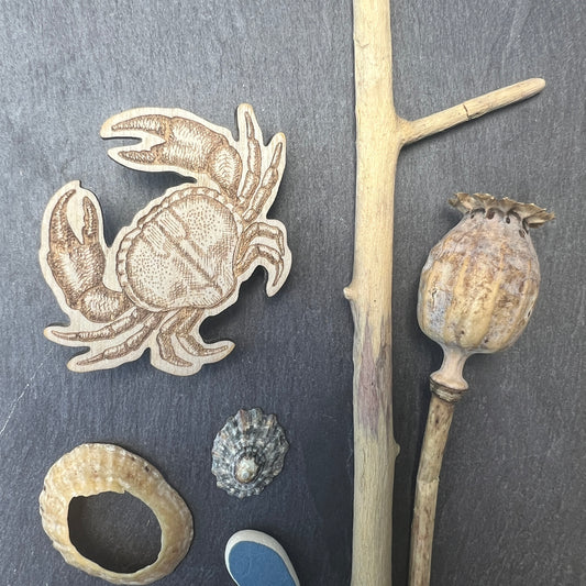 Crab etched wooden badge