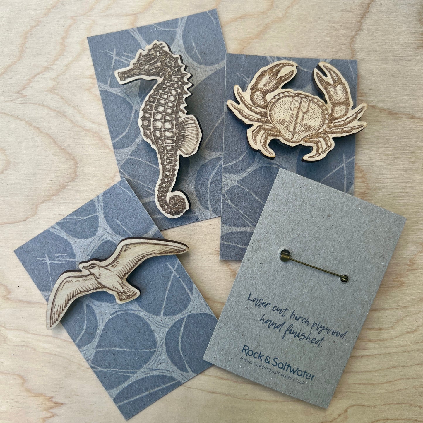 Starfish etched wooden badge