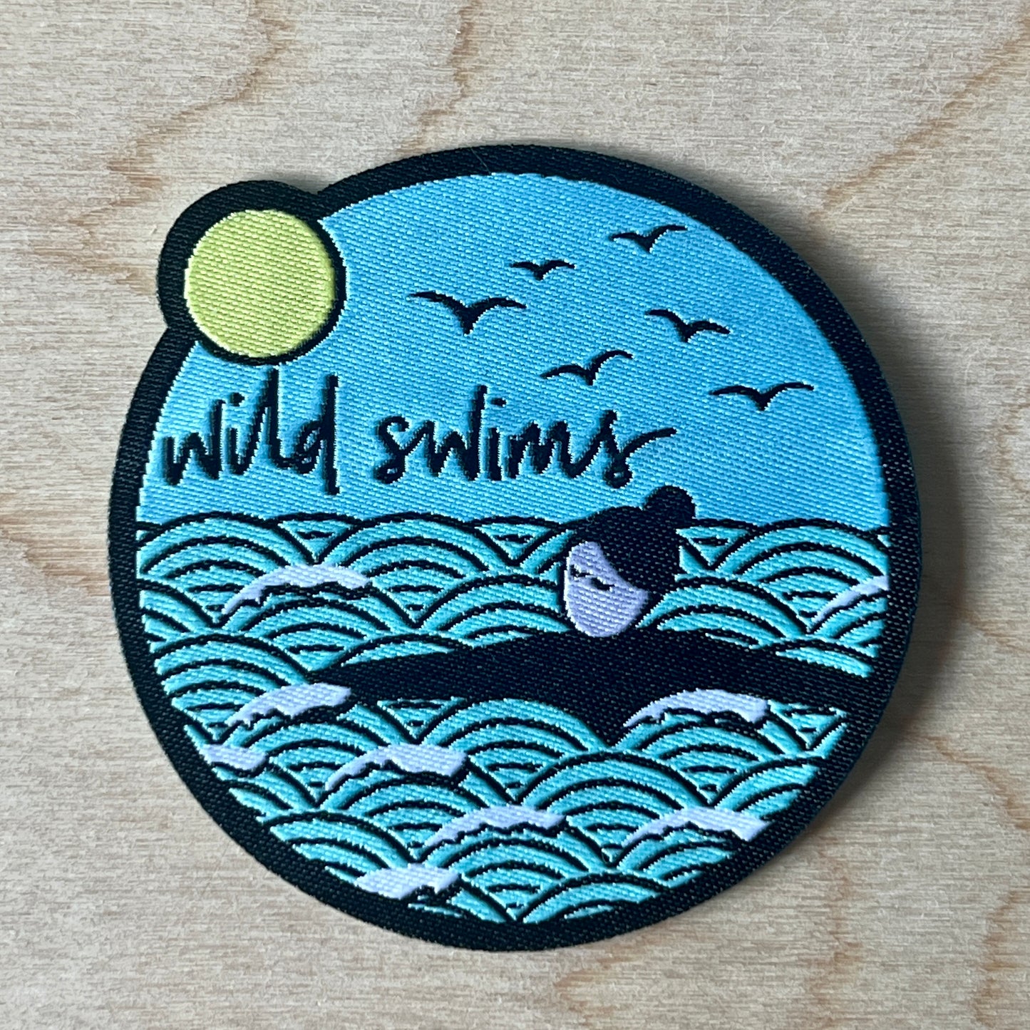 Wild swims woven badge