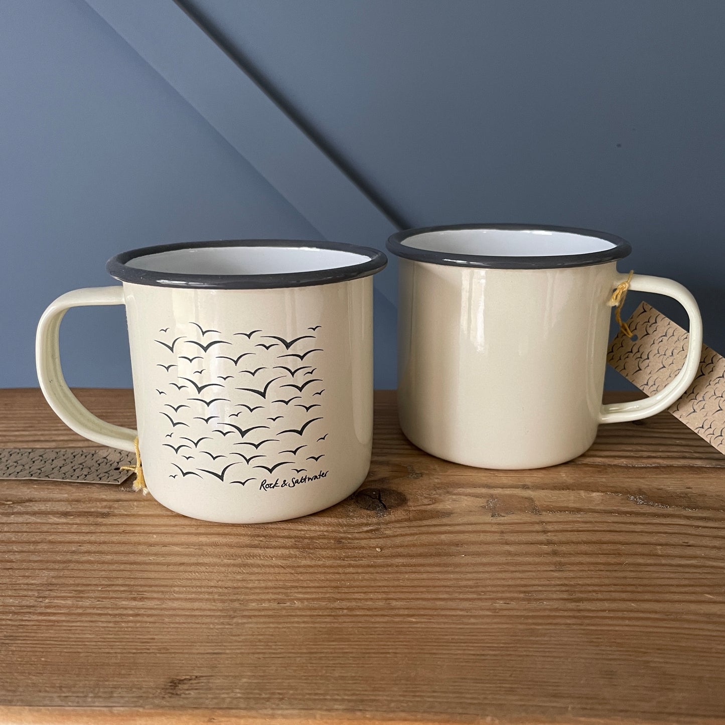 Cream and grey enamel mugs