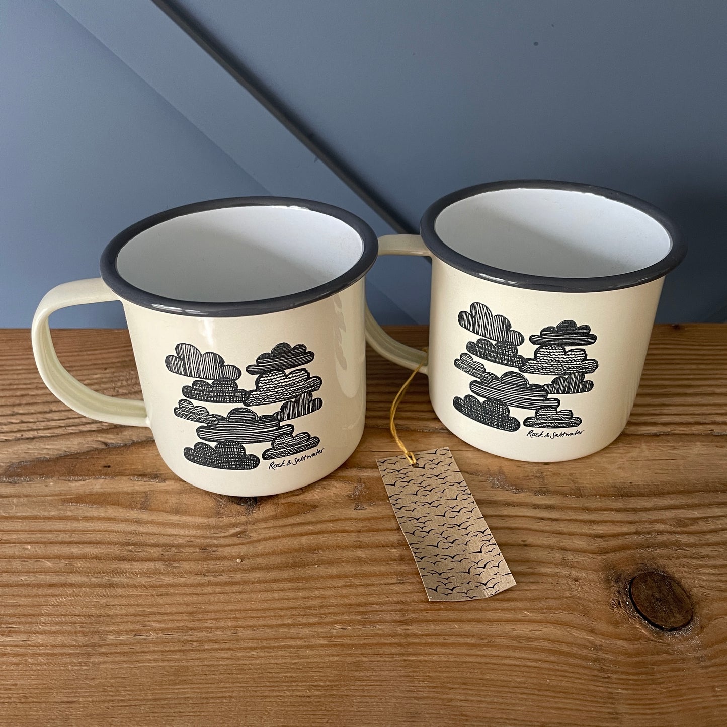 Cream and grey enamel mugs