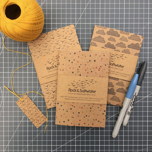 Individual A6 notebooks | clouds, seagulls and paint illustrations