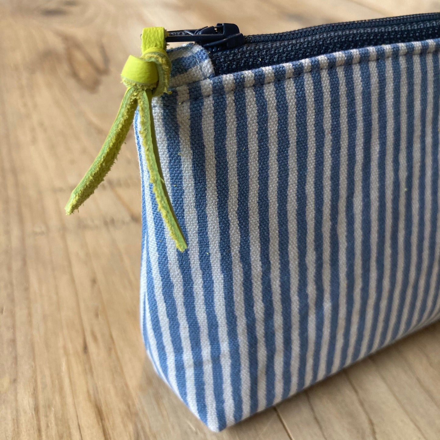 Blue stripe boxed zipped pouch with leather zip pull