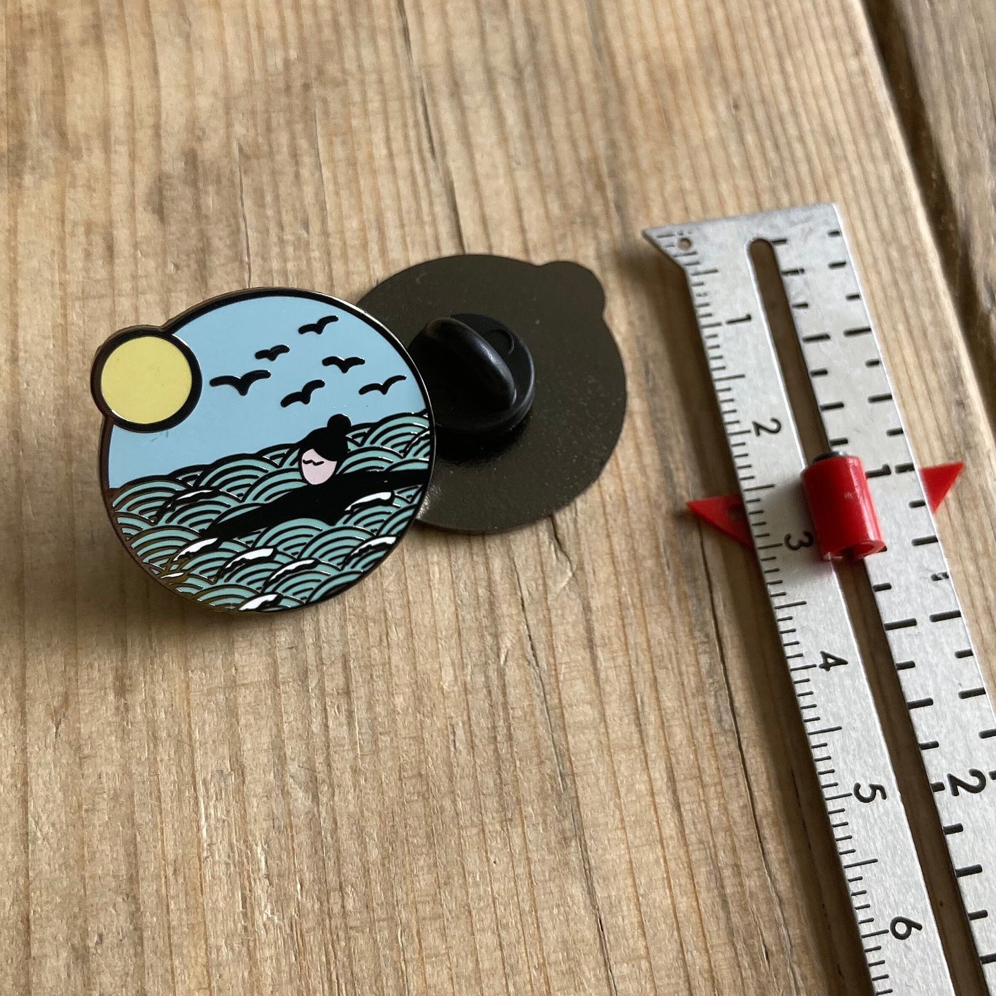 Slight seconds | wild swims enamel pin