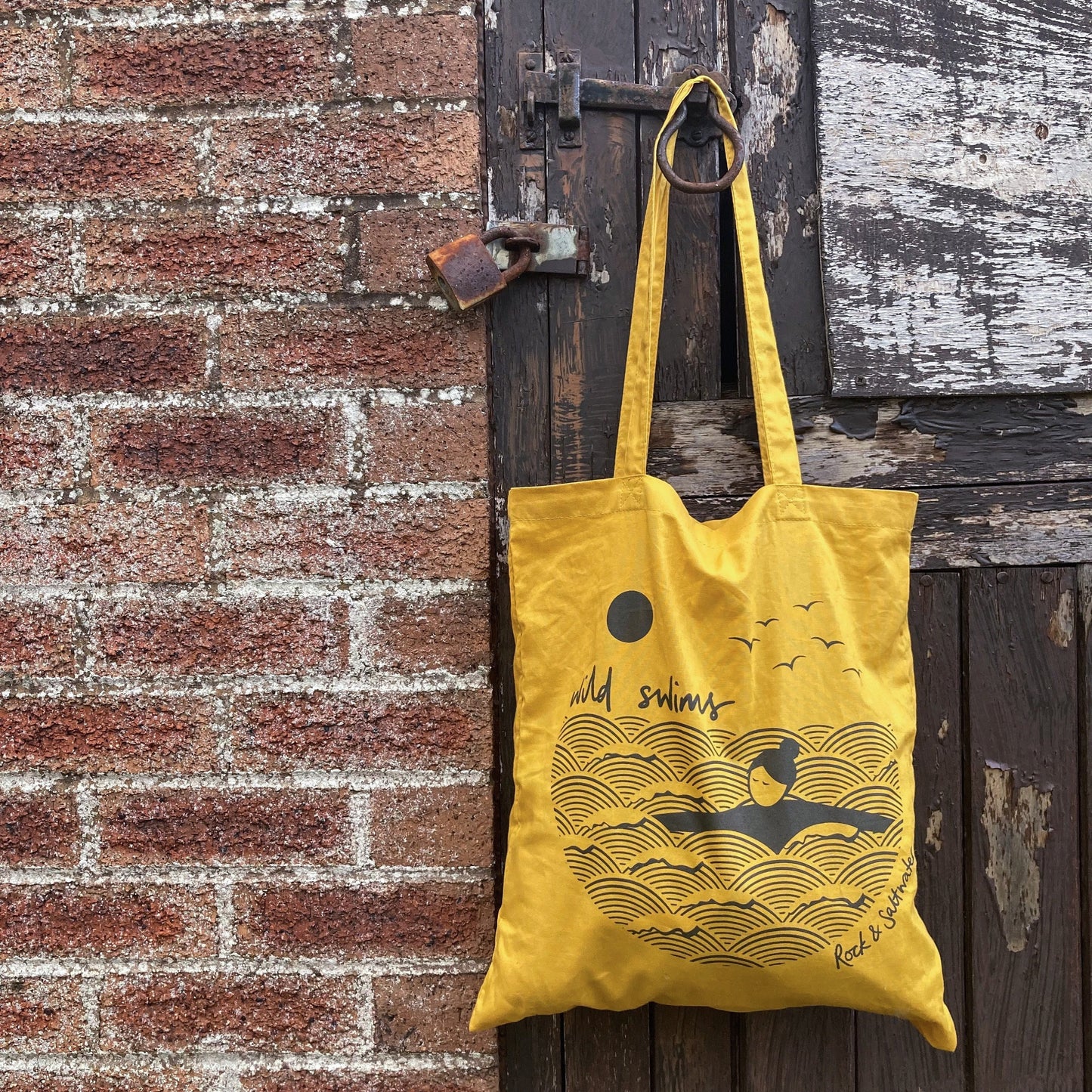 Mustard yellow 'wild swims' screen printed cotton tote bag
