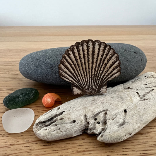 Shell etched wooden brooch
