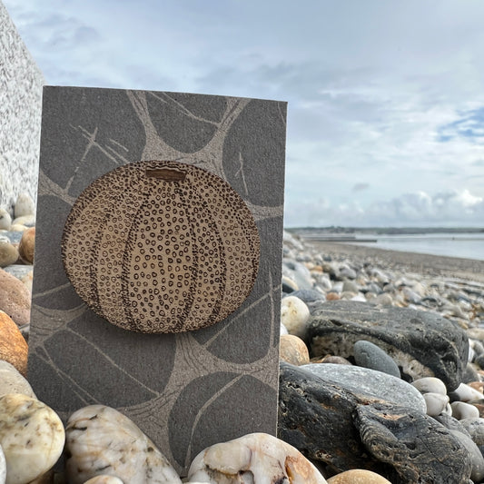 Sea urchin etched wooden brooch