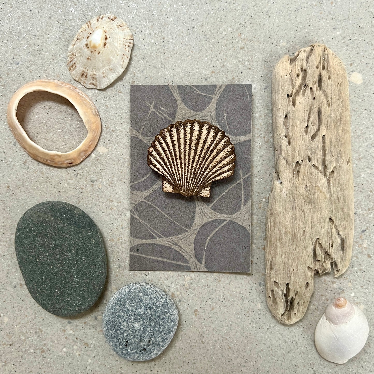Shell etched wooden brooch