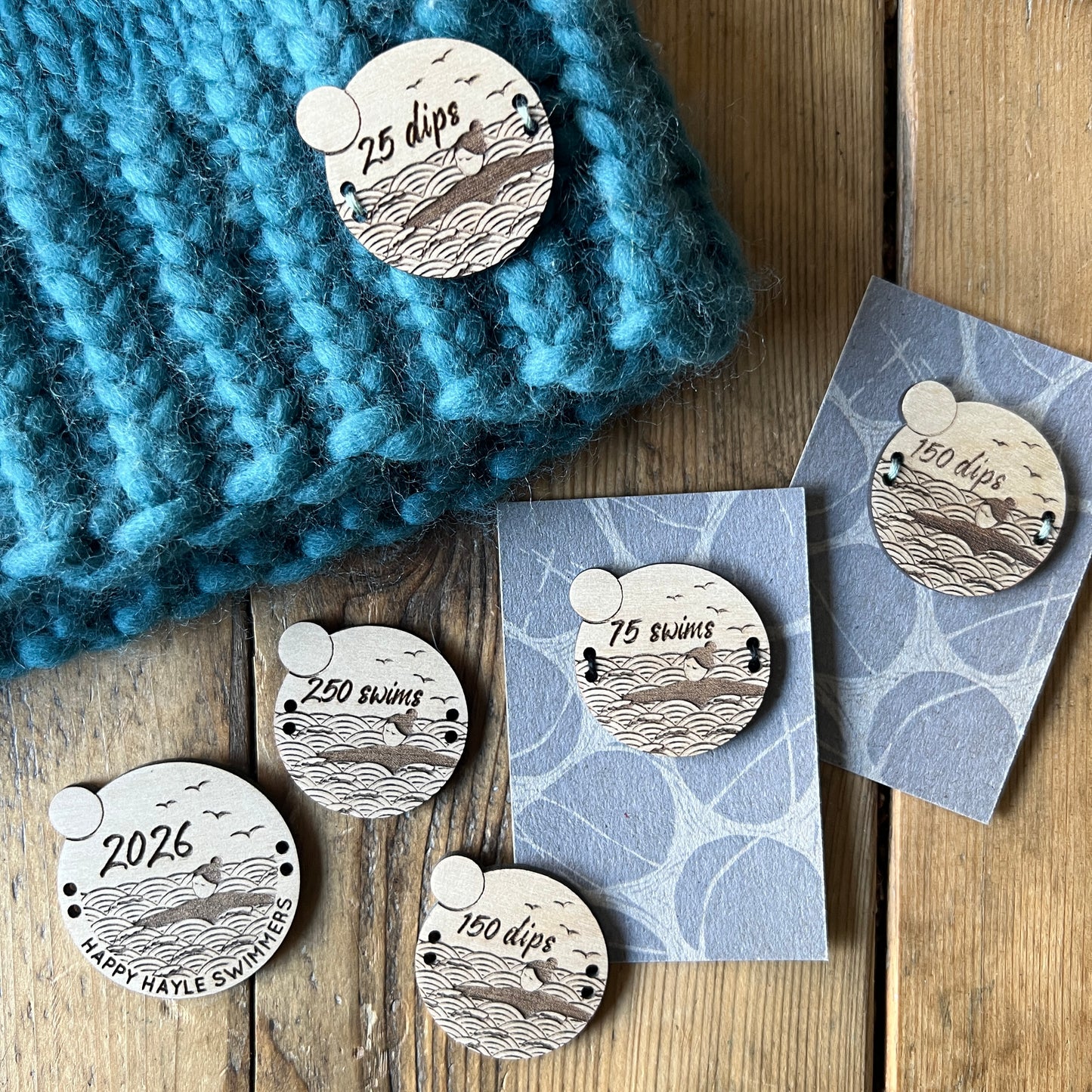 Wild swimming milestone sew-on wooden badges