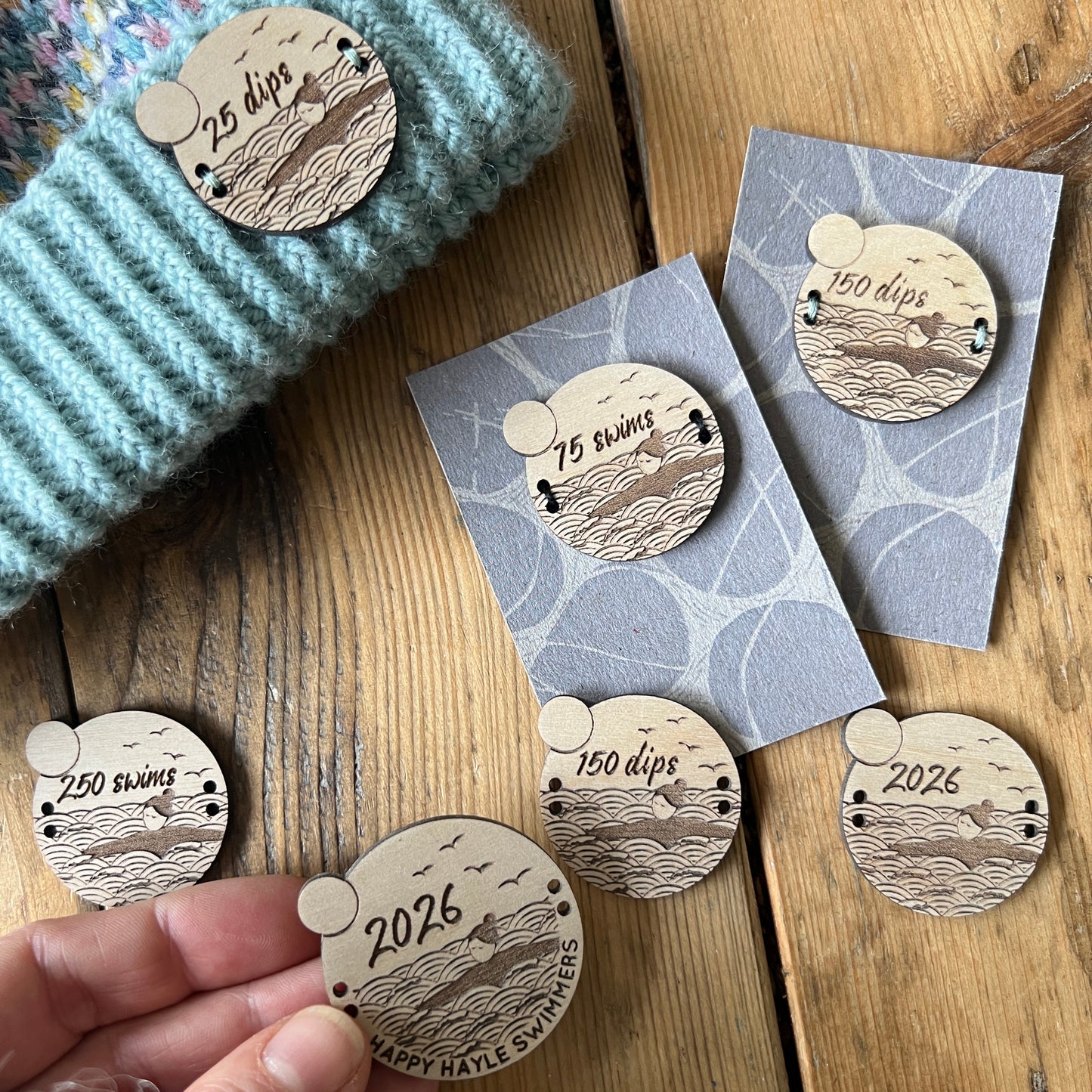 Wild swimming milestone sew-on wooden badges