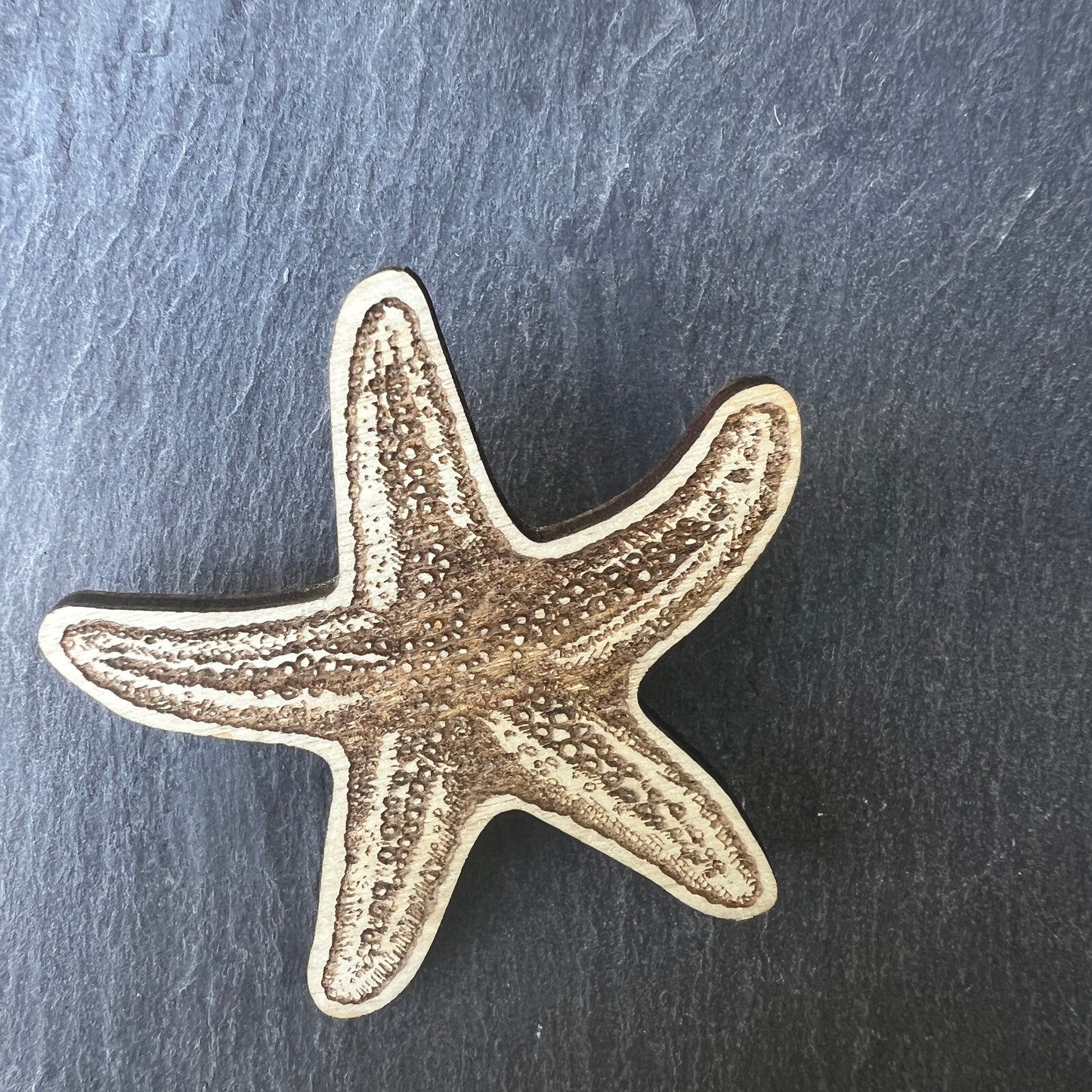 Starfish etched wooden badge