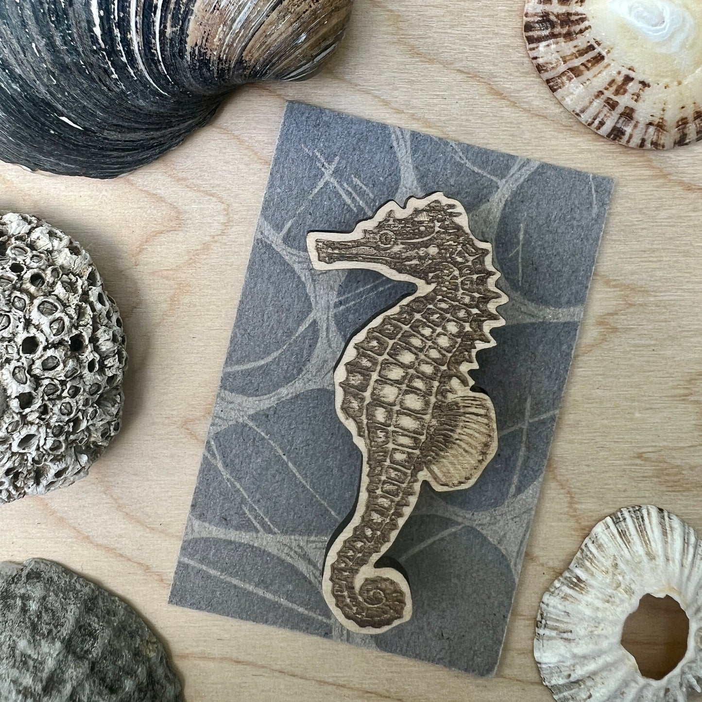 Seahorse etched wooden badge