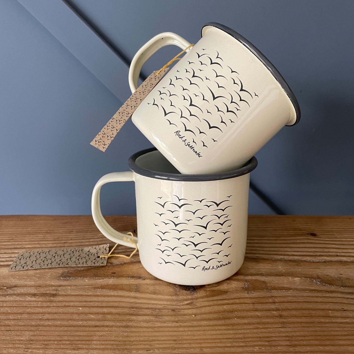 Cream and grey enamel mugs