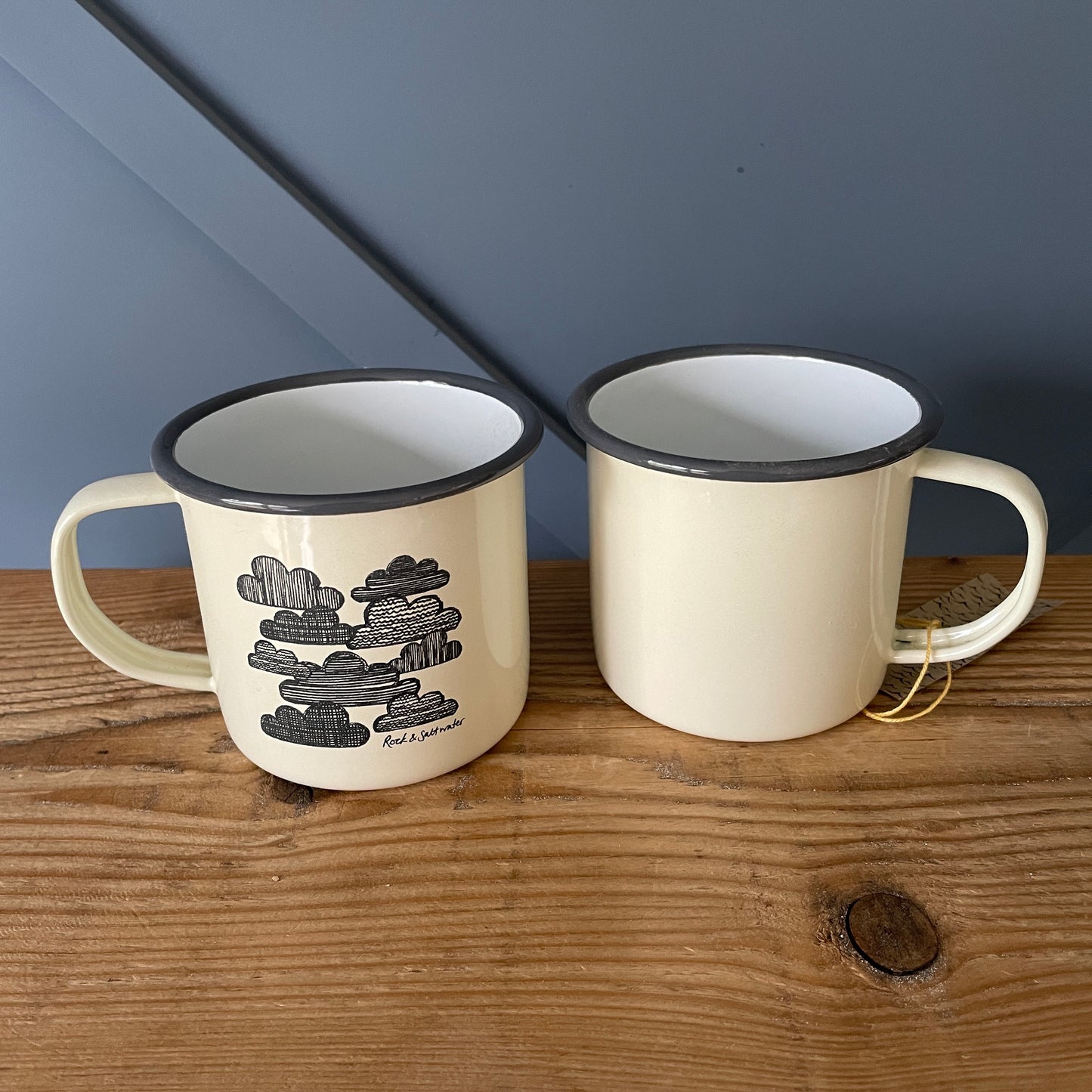 Cream and grey enamel mugs