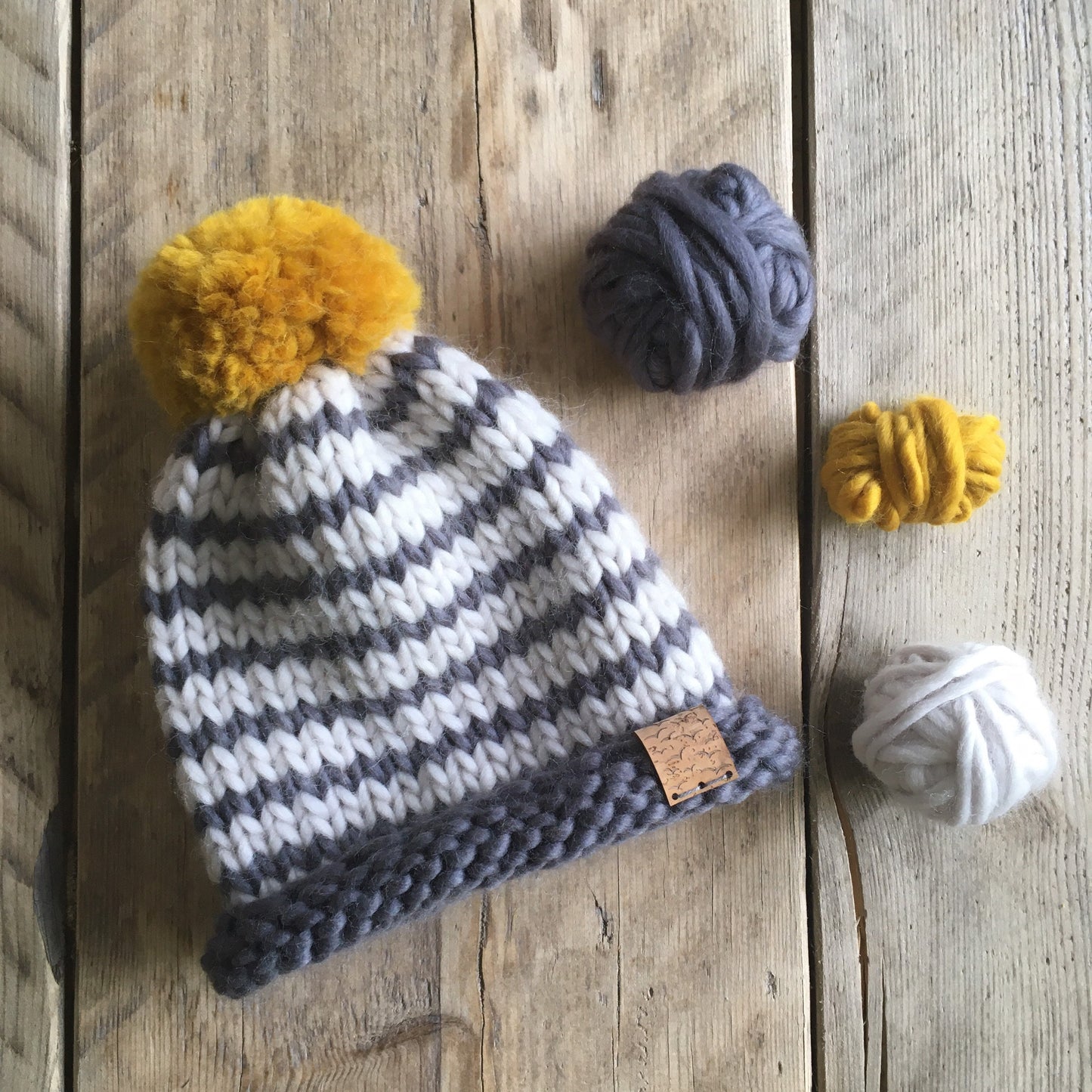 Bobble Hat | baby size | striped grey and yellow | merino wool handknit hat