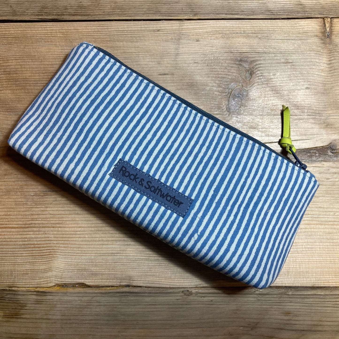Blue stripe boxed zipped pouch with leather zip pull